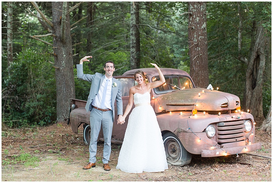 bride and groom with vintage truck 