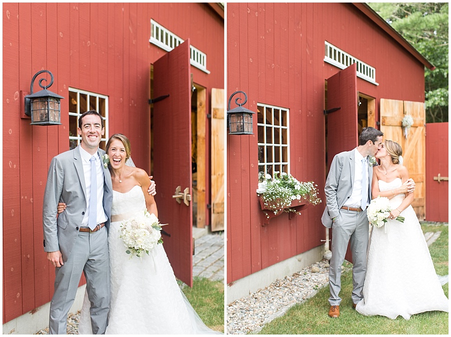 bride and groom in front of red barn