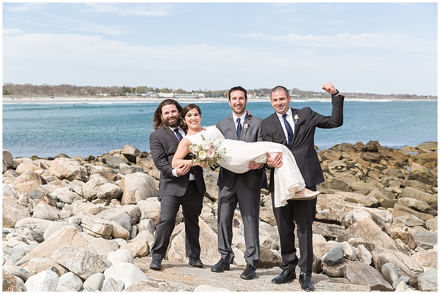 Bride gets picked up by groomsmen at Narragansett beach