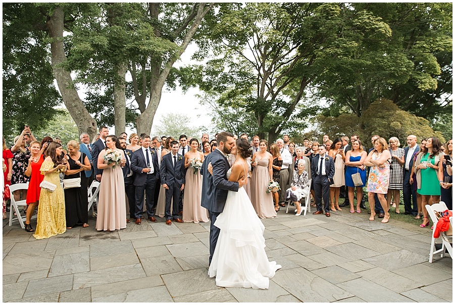 Bride and Groom share first dance on patio at Glen Manor