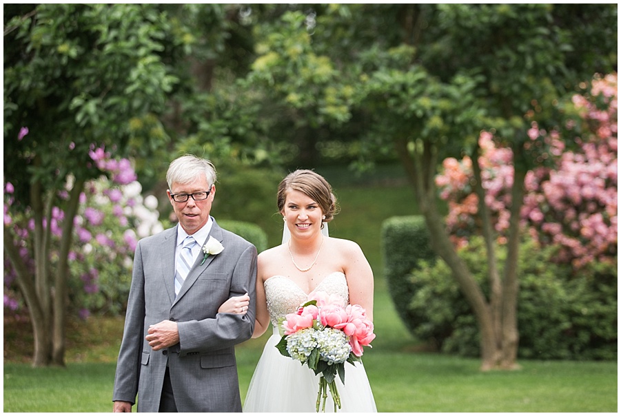 Bride walks down the aisle with father 