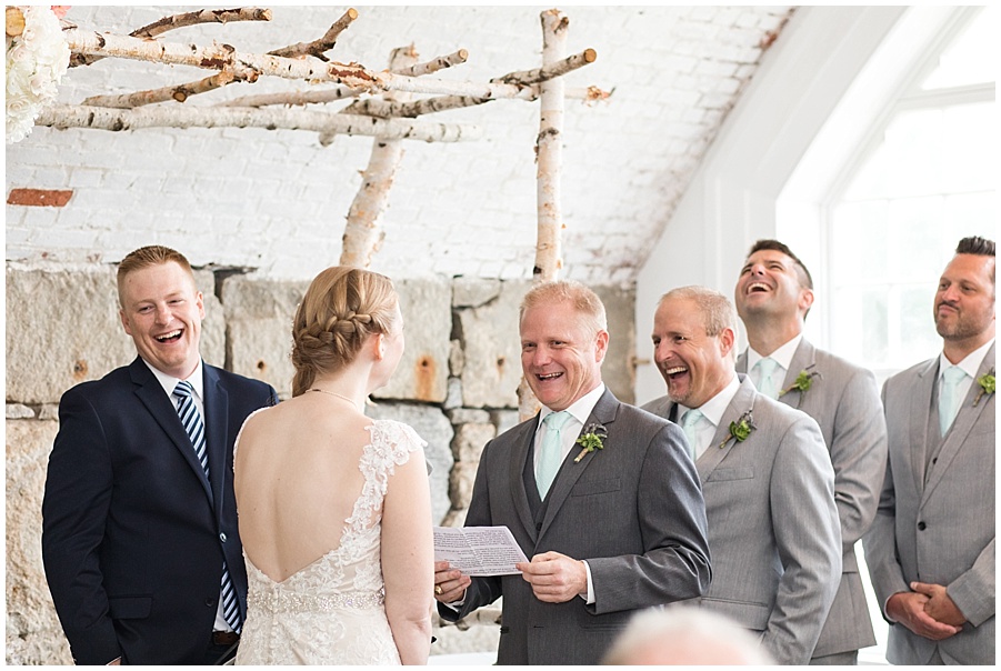 groom says vows to bride as they laugh