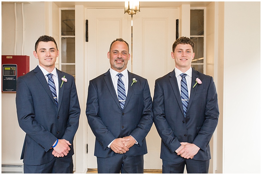 groom and sons before wedding ceremony