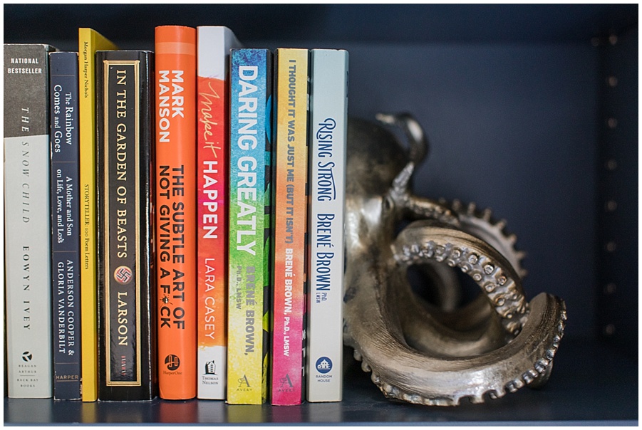 coastal chic home office bookshelf with octopus bookends