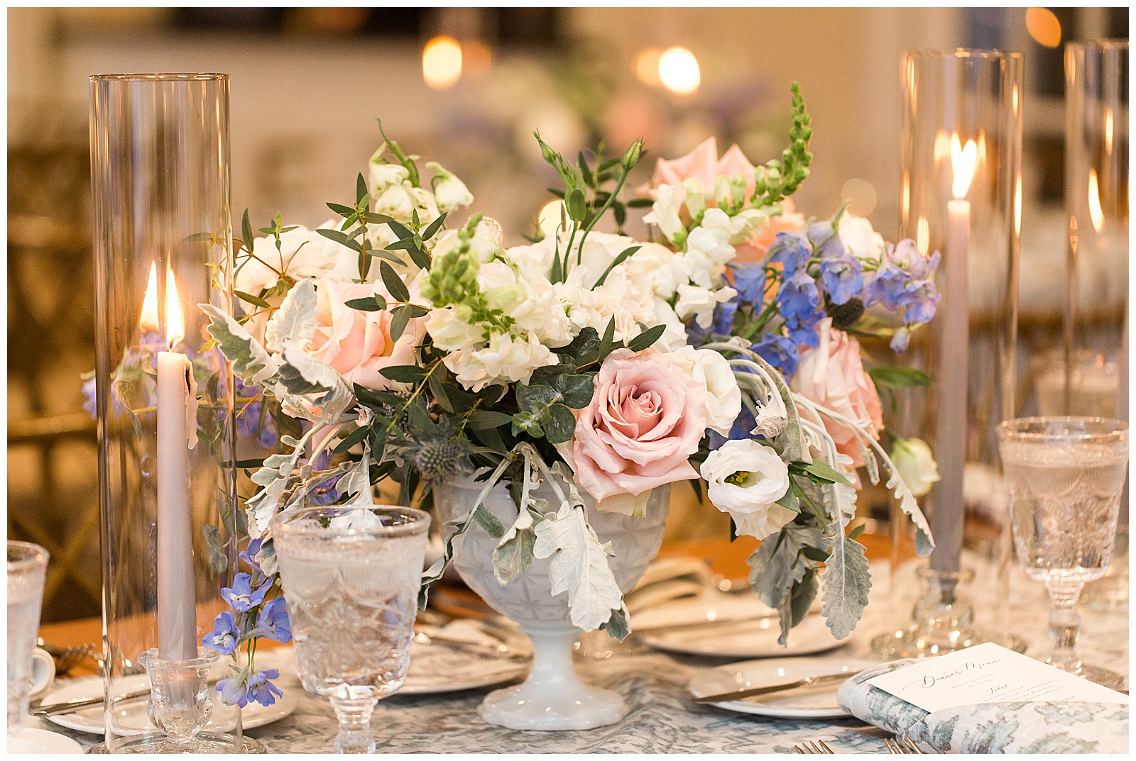 Table arrangements by Beach Plum Florals and Jessica Hennessey Weddings