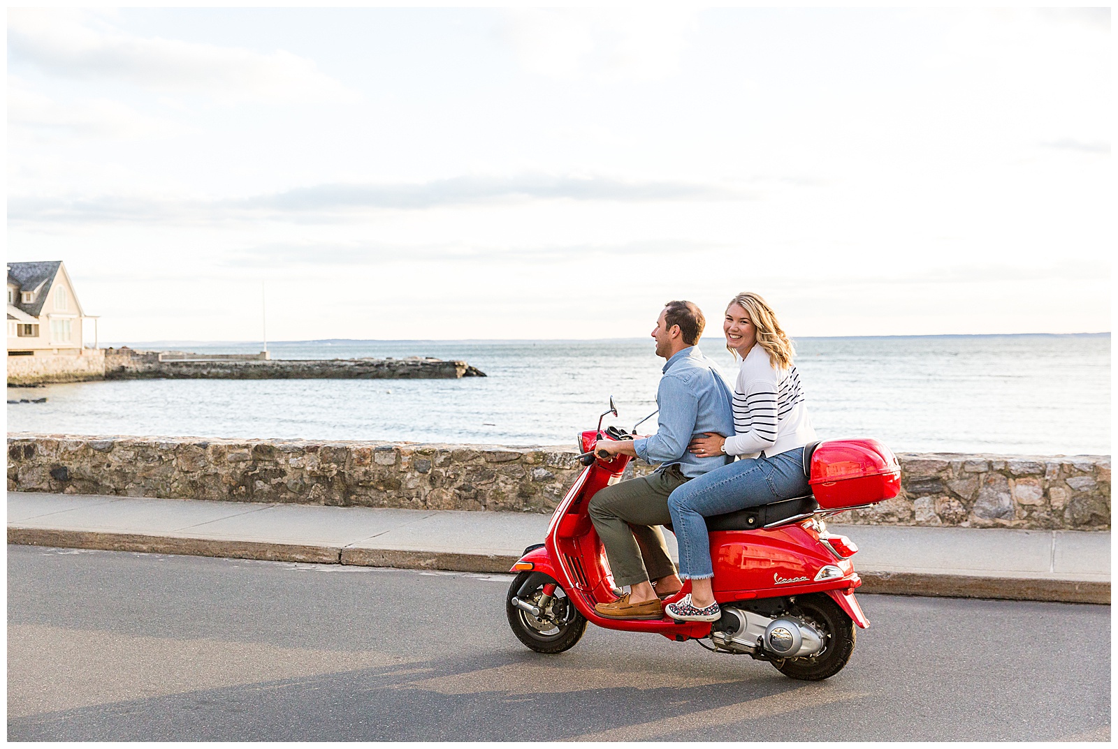 engagement photo session on a red vespa scooter