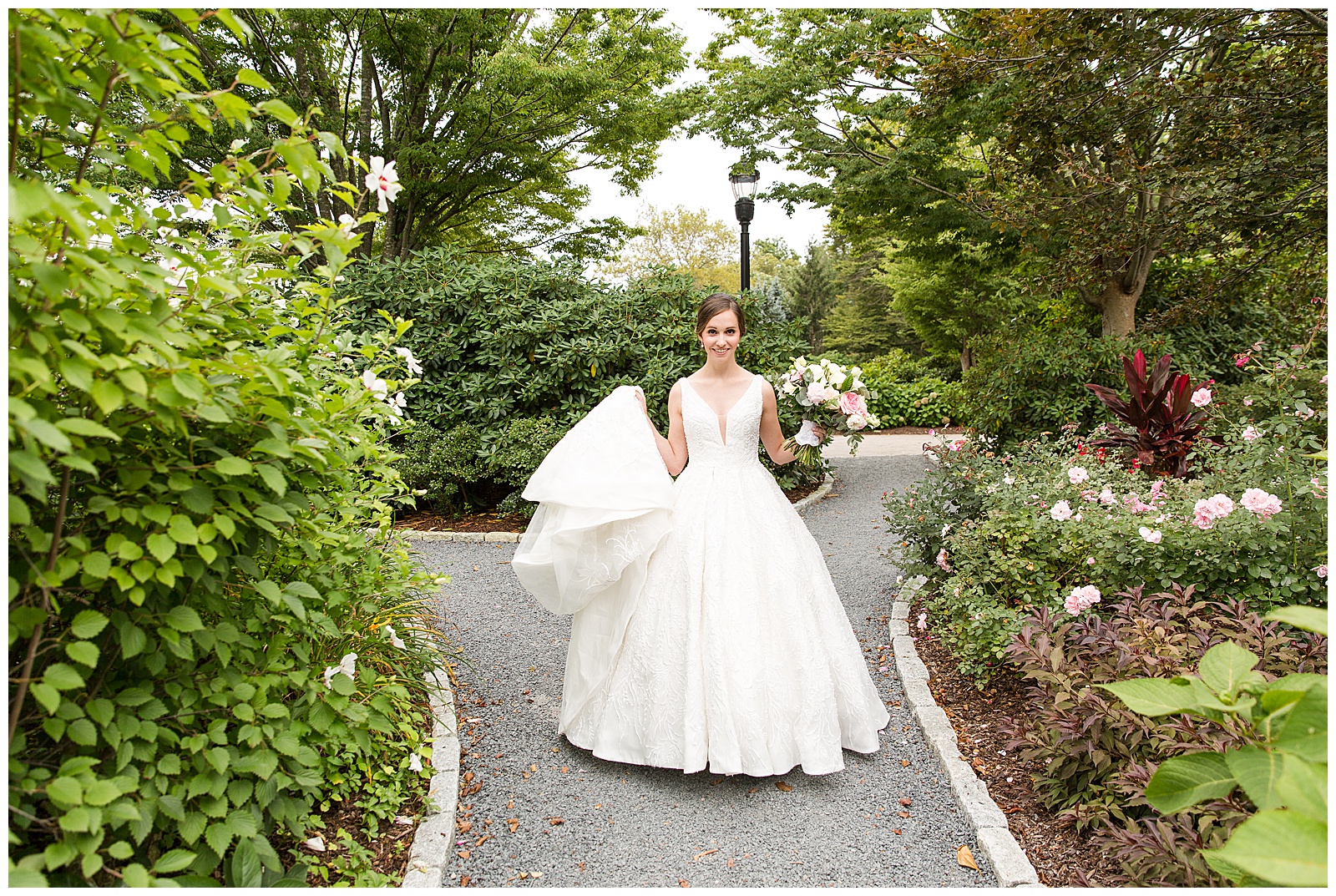 Bride walks down the garden path to meet her groom