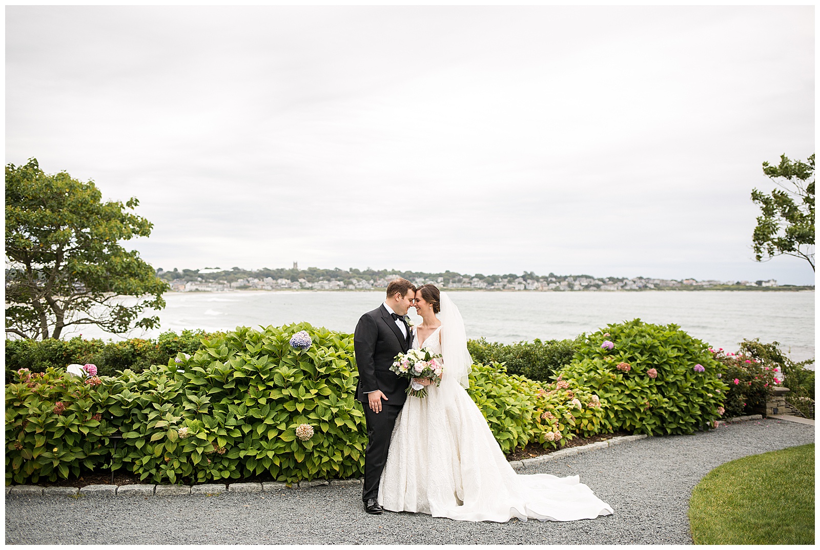Bride and Groom share a moment near the ocean at the Chanler