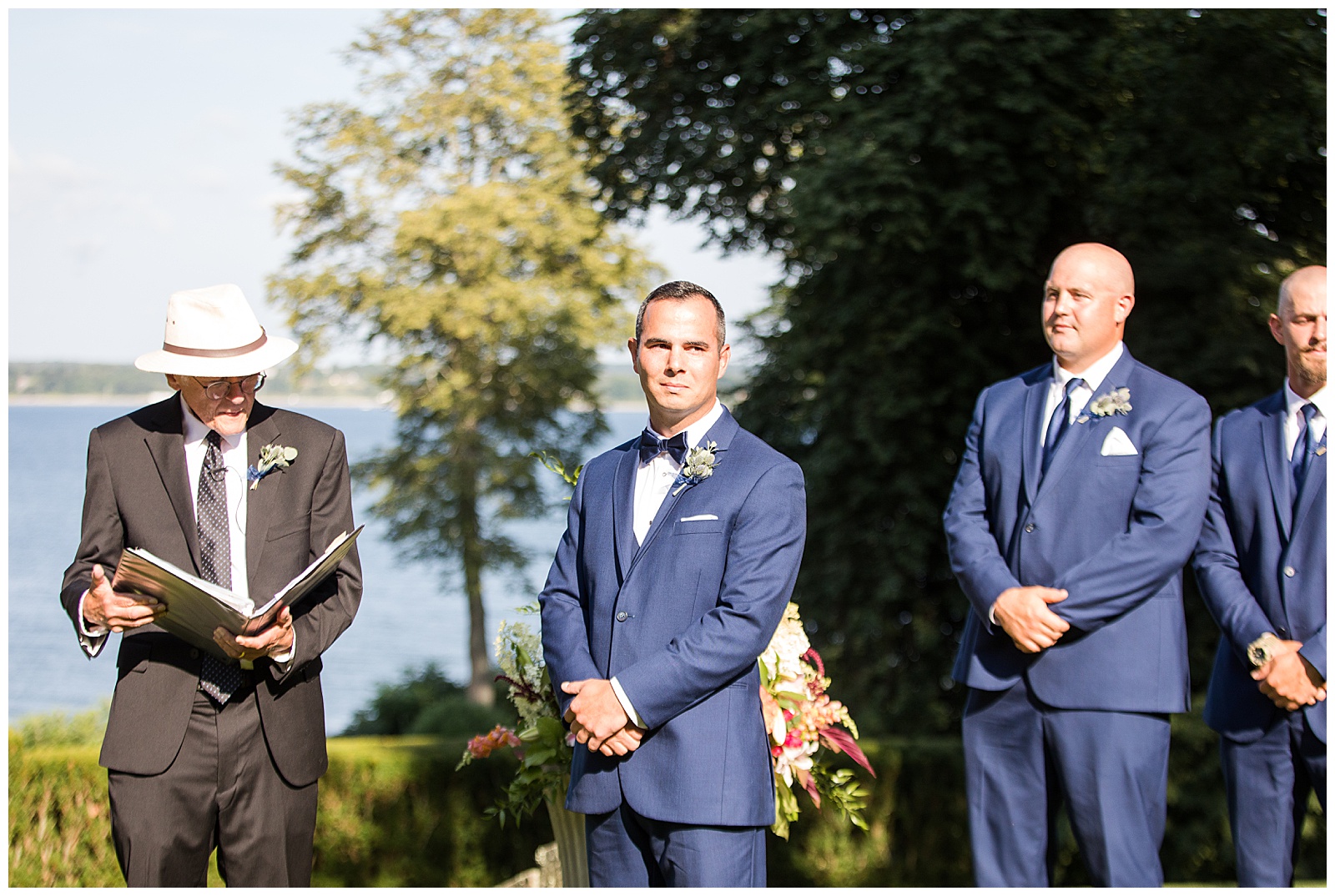 Groom watches as the bride makes her way down the aisle at Glen Manor