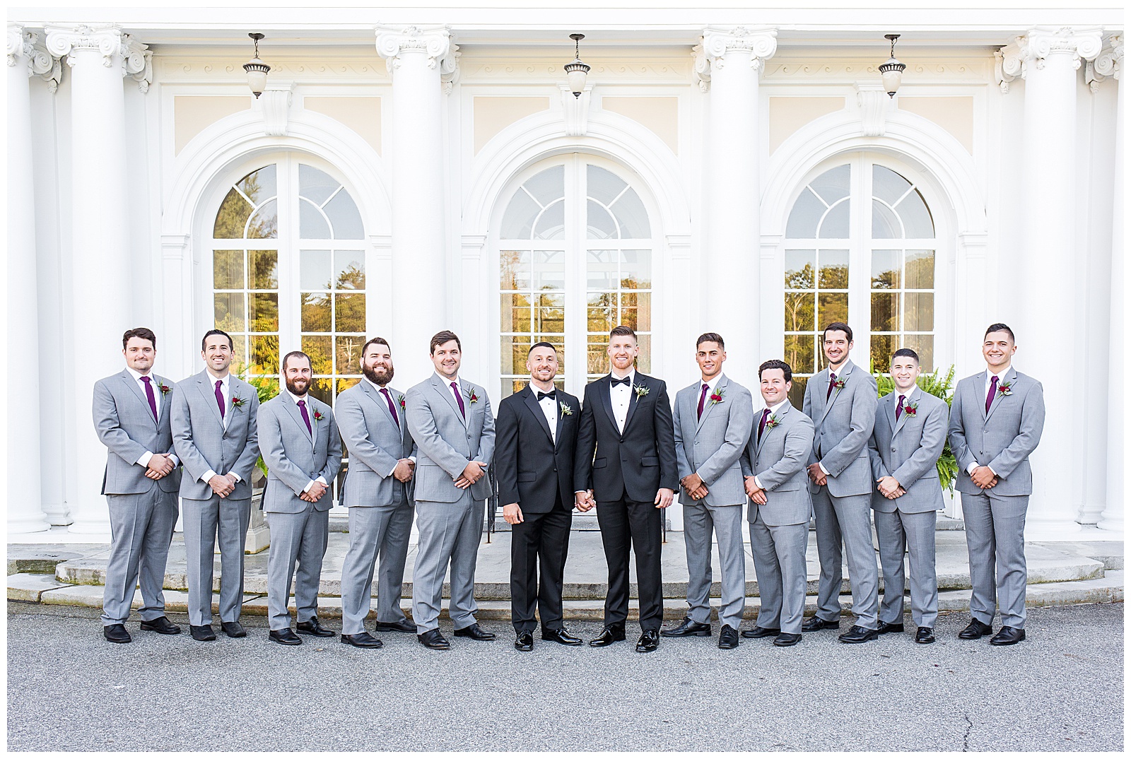 Grooms and their groomsmen outside Tupper Manor