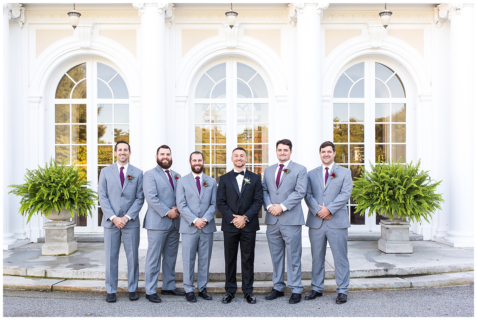 Grooms and their groomsmen outside Tupper Manor