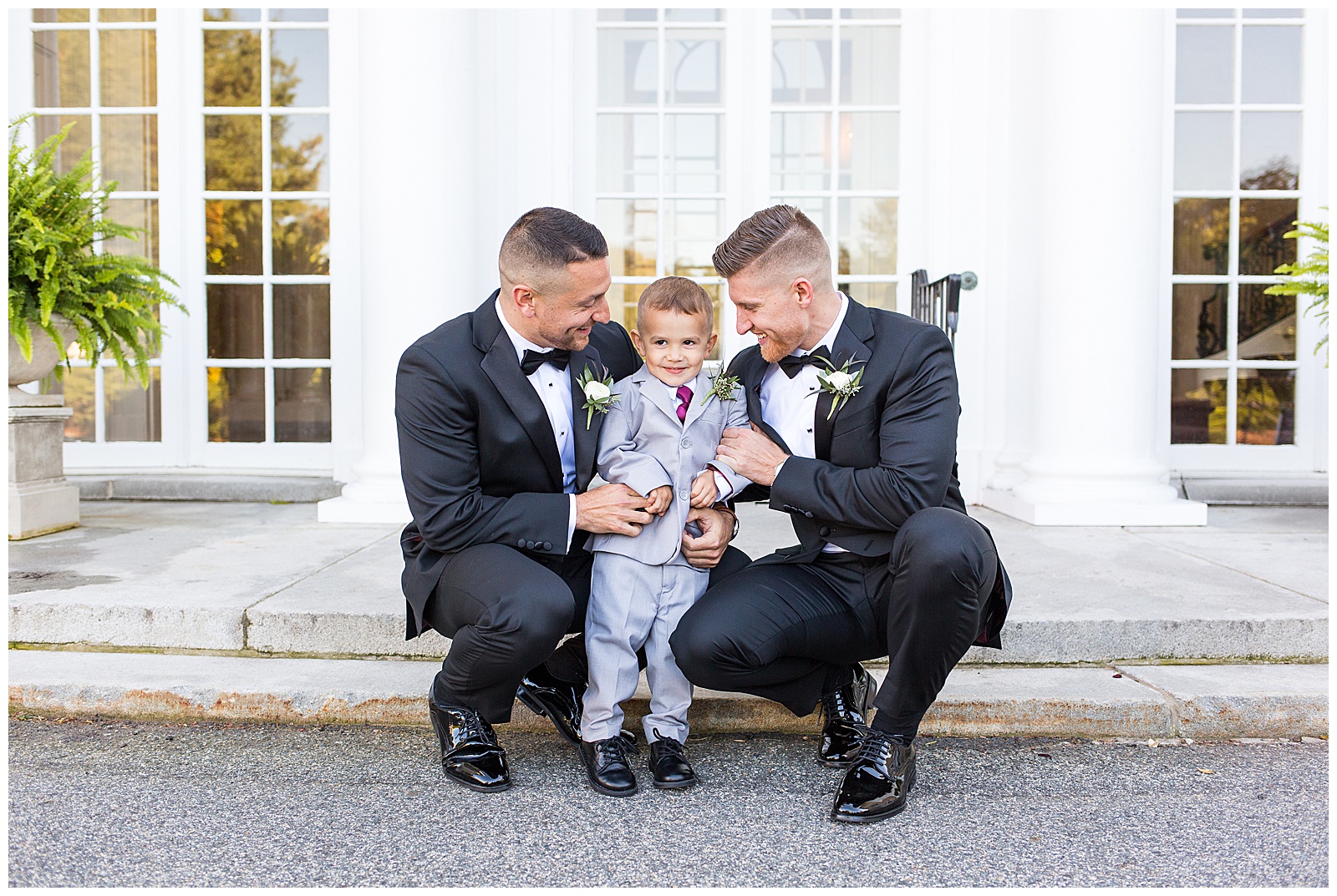 Grooms and their ringbearer outside Tupper Manor