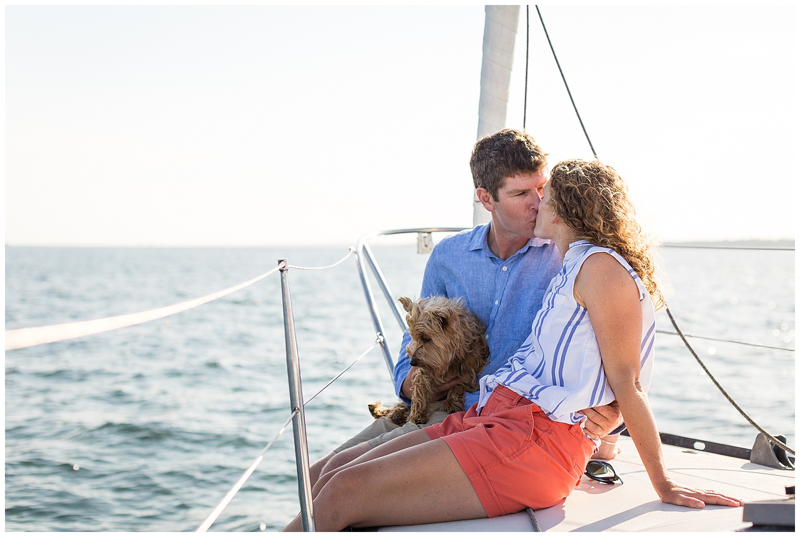 engagement photo session on couple's sailboat