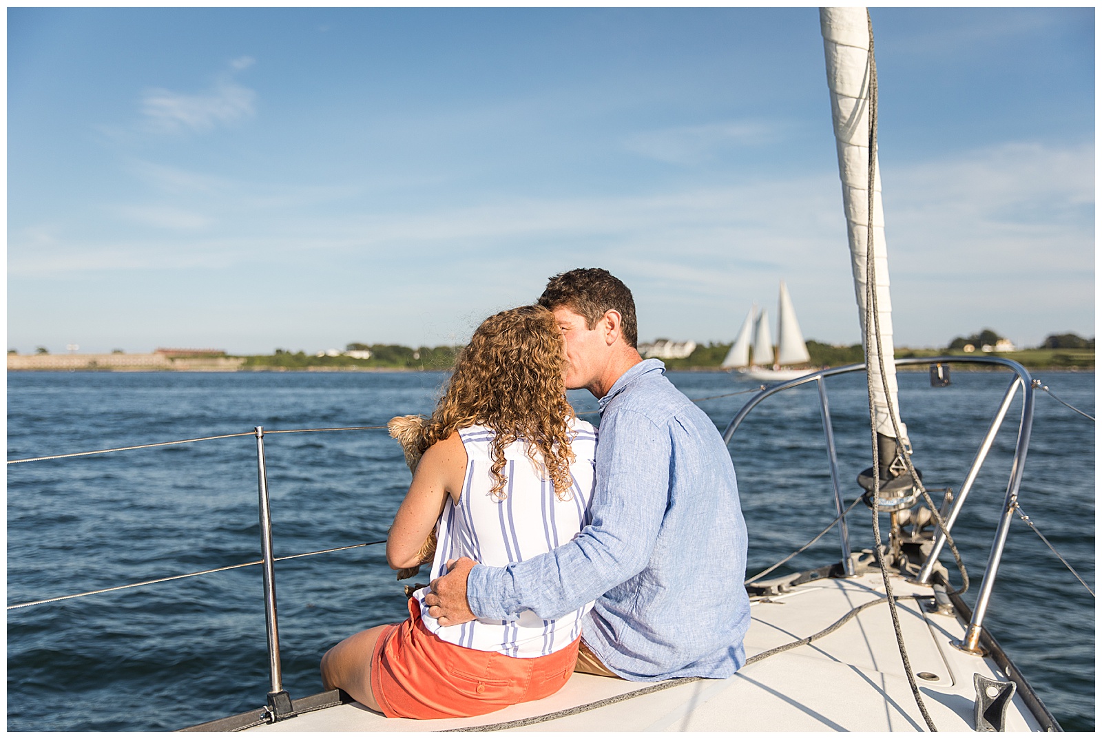 Couple has nautical engagement session on their sailboat in RI