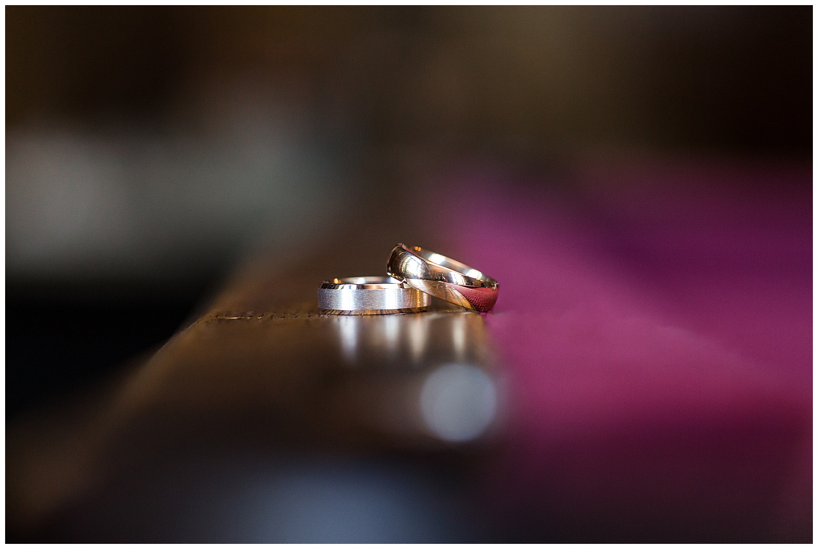 wedding bands on a pool table